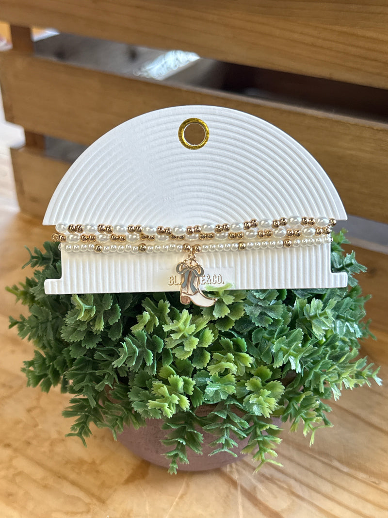 Set of Three Gold & Pearl Stretch Bracelets With Boot Charms
