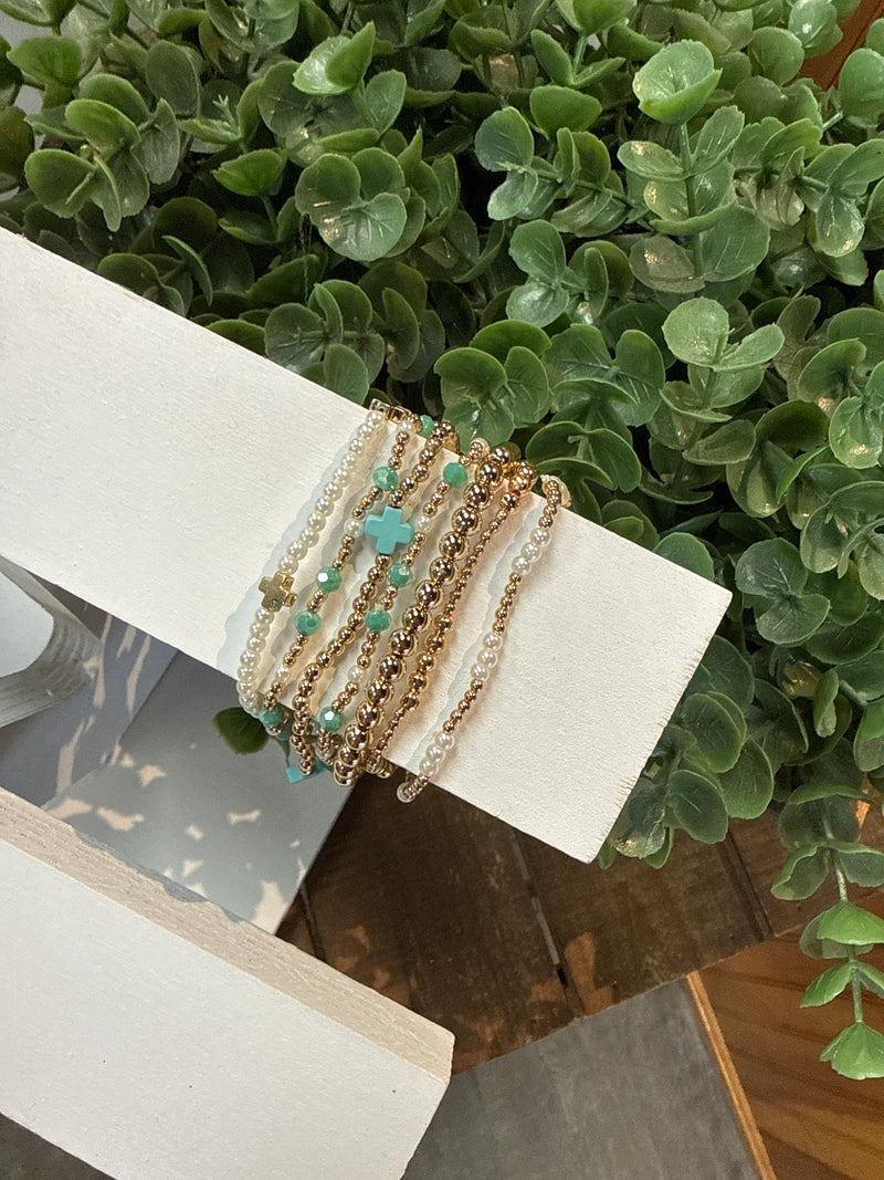 Set Of 7 Pearl & Gold With Turquoise Cross Stretch Bracelets