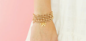 Bow Gold Charm Bracelet